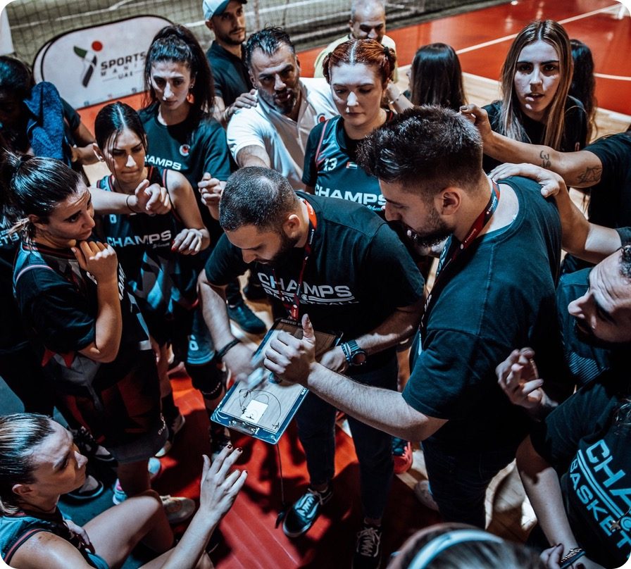 A team huddle after winning the title
